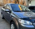 Серый Шевроле Авео, объемом двигателя 1.5 л и пробегом 238 тыс. км за 3100 $, фото 1 на Automoto.ua