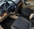Серый Шевроле Авео, объемом двигателя 1.6 л и пробегом 106 тыс. км за 3100 $, фото 4 на Automoto.ua