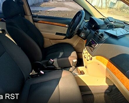 Серый Шевроле Авео, объемом двигателя 1.6 л и пробегом 252 тыс. км за 3350 $, фото 4 на Automoto.ua