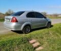 Серый Шевроле Авео, объемом двигателя 1.6 л и пробегом 200 тыс. км за 3900 $, фото 1 на Automoto.ua