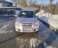 Серый Шевроле Авео, объемом двигателя 1.6 л и пробегом 258 тыс. км за 3450 $, фото 1 на Automoto.ua