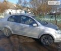 Сірий Шевроле Авео, об'ємом двигуна 1.6 л та пробігом 250 тис. км за 3900 $, фото 1 на Automoto.ua