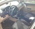 Серый Шевроле Авео, объемом двигателя 1.6 л и пробегом 270 тыс. км за 4500 $, фото 1 на Automoto.ua