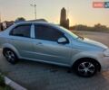Серый Шевроле Авео, объемом двигателя 1.6 л и пробегом 290 тыс. км за 4000 $, фото 1 на Automoto.ua