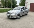 Серый Шевроле Авео, объемом двигателя 1.6 л и пробегом 210 тыс. км за 3800 $, фото 1 на Automoto.ua