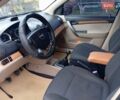 Серый Шевроле Авео, объемом двигателя 1.6 л и пробегом 223 тыс. км за 4200 $, фото 4 на Automoto.ua