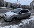Серый Шевроле Авео, объемом двигателя 1.6 л и пробегом 262 тыс. км за 3200 $, фото 1 на Automoto.ua