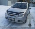 Серый Шевроле Авео, объемом двигателя 1.6 л и пробегом 261 тыс. км за 2810 $, фото 1 на Automoto.ua
