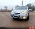 Серый Шевроле Авео, объемом двигателя 1.6 л и пробегом 170 тыс. км за 3900 $, фото 1 на Automoto.ua