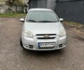 Серый Шевроле Авео, объемом двигателя 1.6 л и пробегом 250 тыс. км за 3700 $, фото 1 на Automoto.ua