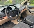 Серый Шевроле Авео, объемом двигателя 1.6 л и пробегом 260 тыс. км за 3000 $, фото 3 на Automoto.ua