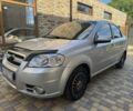 Серый Шевроле Авео, объемом двигателя 1.6 л и пробегом 240 тыс. км за 3850 $, фото 1 на Automoto.ua