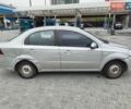 Серый Шевроле Авео, объемом двигателя 1.6 л и пробегом 243 тыс. км за 3700 $, фото 1 на Automoto.ua