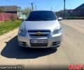 Серый Шевроле Авео, объемом двигателя 1.6 л и пробегом 122 тыс. км за 5000 $, фото 1 на Automoto.ua