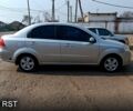 Серый Шевроле Авео, объемом двигателя 1.6 л и пробегом 252 тыс. км за 3350 $, фото 2 на Automoto.ua