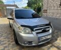 Серый Шевроле Авео, объемом двигателя 1.6 л и пробегом 240 тыс. км за 3850 $, фото 5 на Automoto.ua