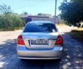 Серый Шевроле Авео, объемом двигателя 1.6 л и пробегом 122 тыс. км за 3950 $, фото 4 на Automoto.ua
