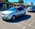 Серый Шевроле Авео, объемом двигателя 1.6 л и пробегом 380 тыс. км за 3500 $, фото 1 на Automoto.ua