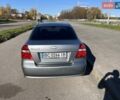 Серый Шевроле Авео, объемом двигателя 1.5 л и пробегом 208 тыс. км за 4400 $, фото 3 на Automoto.ua
