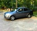 Серый Шевроле Авео, объемом двигателя 1.5 л и пробегом 125 тыс. км за 3999 $, фото 1 на Automoto.ua