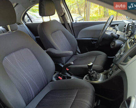 Серый Шевроле Авео, объемом двигателя 1.6 л и пробегом 143 тыс. км за 7000 $, фото 9 на Automoto.ua