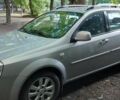 Серый Шевроле Авео, объемом двигателя 1.6 л и пробегом 170 тыс. км за 5900 $, фото 1 на Automoto.ua