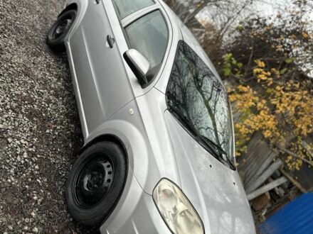 Серый Шевроле Авео, объемом двигателя 1.5 л и пробегом 250 тыс. км за 2450 $, фото 1 на Automoto.ua