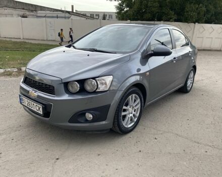 Серый Шевроле Авео, объемом двигателя 1.6 л и пробегом 143 тыс. км за 5600 $, фото 1 на Automoto.ua