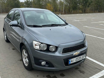 Серый Шевроле Авео, объемом двигателя 1.4 л и пробегом 170 тыс. км за 7000 $, фото 1 на Automoto.ua