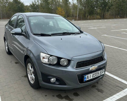 Серый Шевроле Авео, объемом двигателя 1.4 л и пробегом 170 тыс. км за 7000 $, фото 1 на Automoto.ua