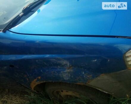 Синий Шевроле Авео, объемом двигателя 1.4 л и пробегом 230 тыс. км за 1550 $, фото 2 на Automoto.ua