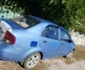 Синий Шевроле Авео, объемом двигателя 1.5 л и пробегом 260 тыс. км за 1800 $, фото 1 на Automoto.ua