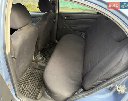 Синій Шевроле Авео, об'ємом двигуна 1.5 л та пробігом 158 тис. км за 4200 $, фото 8 на Automoto.ua