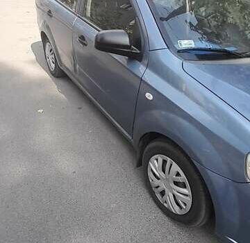 Синій Шевроле Авео, об'ємом двигуна 1.1 л та пробігом 244 тис. км за 4200 $, фото 1 на Automoto.ua