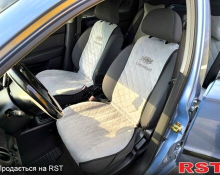 Синий Шевроле Авео, объемом двигателя 15 л и пробегом 147 тыс. км за 4750 $, фото 3 на Automoto.ua