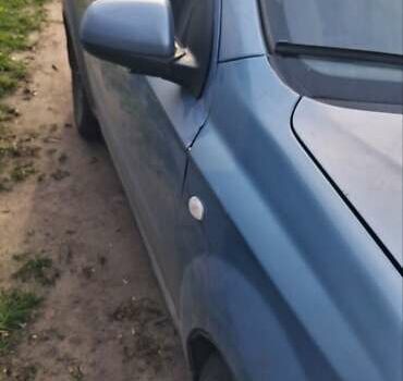 Синий Шевроле Авео, объемом двигателя 1.6 л и пробегом 310 тыс. км за 1550 $, фото 1 на Automoto.ua