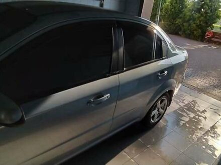 Синий Шевроле Авео, объемом двигателя 1.6 л и пробегом 104 тыс. км за 4000 $, фото 1 на Automoto.ua