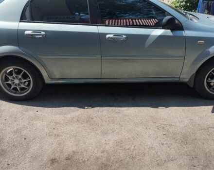 Зелений Шевроле Авео, об'ємом двигуна 1.6 л та пробігом 324 тис. км за 4000 $, фото 2 на Automoto.ua