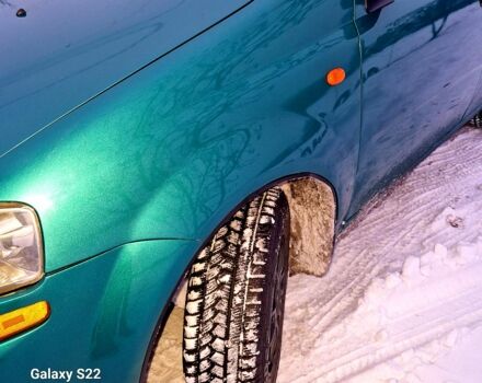 Зеленый Шевроле Авео, объемом двигателя 1.5 л и пробегом 240 тыс. км за 4000 $, фото 3 на Automoto.ua