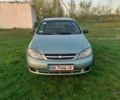 Зелений Шевроле Авео, об'ємом двигуна 1.6 л та пробігом 300 тис. км за 2999 $, фото 1 на Automoto.ua