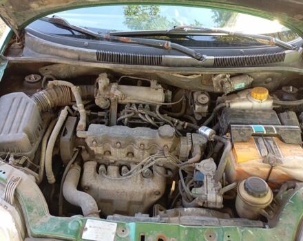 Зелений Шевроле Авео, об'ємом двигуна 1.5 л та пробігом 280 тис. км за 1550 $, фото 5 на Automoto.ua