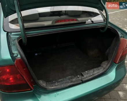 Зелений Шевроле Авео, об'ємом двигуна 1.5 л та пробігом 300 тис. км за 2350 $, фото 39 на Automoto.ua