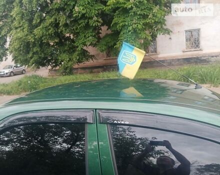 Зеленый Шевроле Авео, объемом двигателя 1.5 л и пробегом 305 тыс. км за 2000 $, фото 4 на Automoto.ua