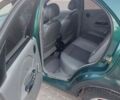 Зеленый Шевроле Авео, объемом двигателя 1.5 л и пробегом 310 тыс. км за 2000 $, фото 2 на Automoto.ua