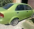 Зеленый Шевроле Авео, объемом двигателя 1.5 л и пробегом 250 тыс. км за 2400 $, фото 1 на Automoto.ua