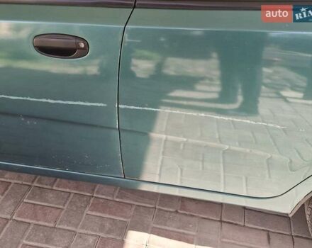 Зеленый Шевроле Авео, объемом двигателя 1.5 л и пробегом 185 тыс. км за 2900 $, фото 7 на Automoto.ua