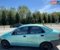 Зеленый Шевроле Авео, объемом двигателя 1.5 л и пробегом 244 тыс. км за 2300 $, фото 1 на Automoto.ua