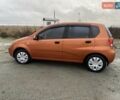 Оранжевый Шевроле Авео, объемом двигателя 1.5 л и пробегом 248 тыс. км за 3550 $, фото 2 на Automoto.ua