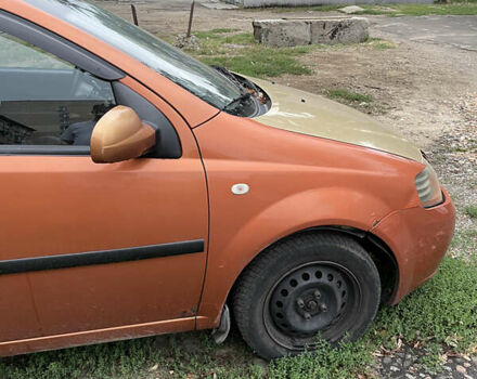 Оранжевый Шевроле Авео, объемом двигателя 1.5 л и пробегом 425 тыс. км за 2300 $, фото 3 на Automoto.ua