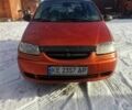 Оранжевый Шевроле Авео, объемом двигателя 1.5 л и пробегом 230 тыс. км за 2600 $, фото 1 на Automoto.ua